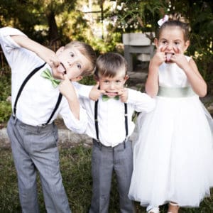 Kids dressed for a wedding party